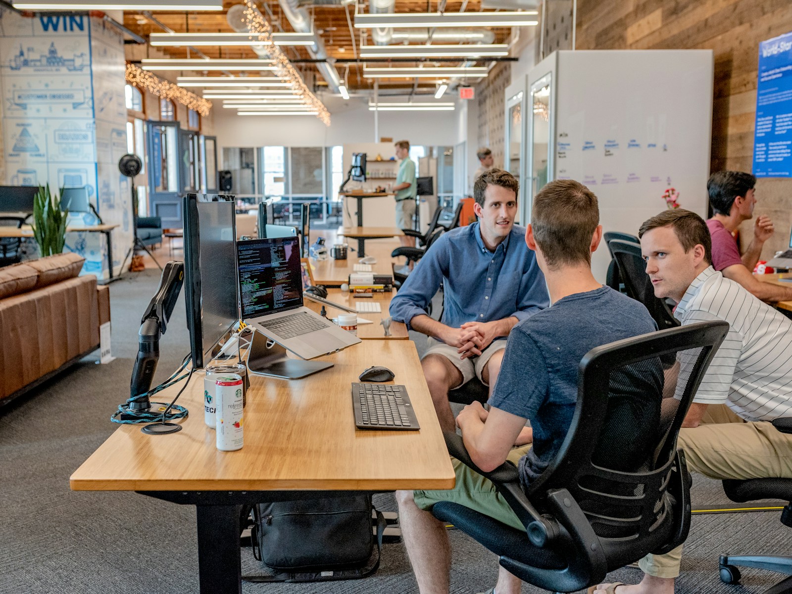 Professionals working together in a bright, welcoming workspace